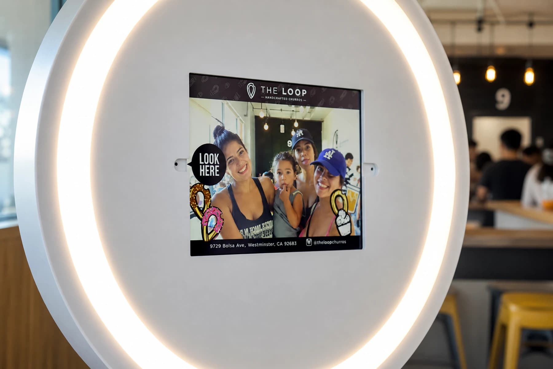 A branded guest photo displayed inside The Loop's BuzzyBooth