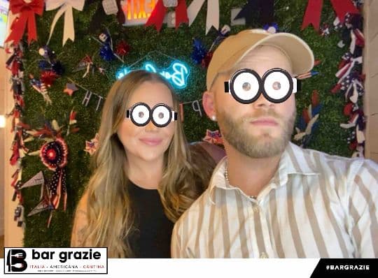 Two Bar Grazie guests posing with cartoon eye filters