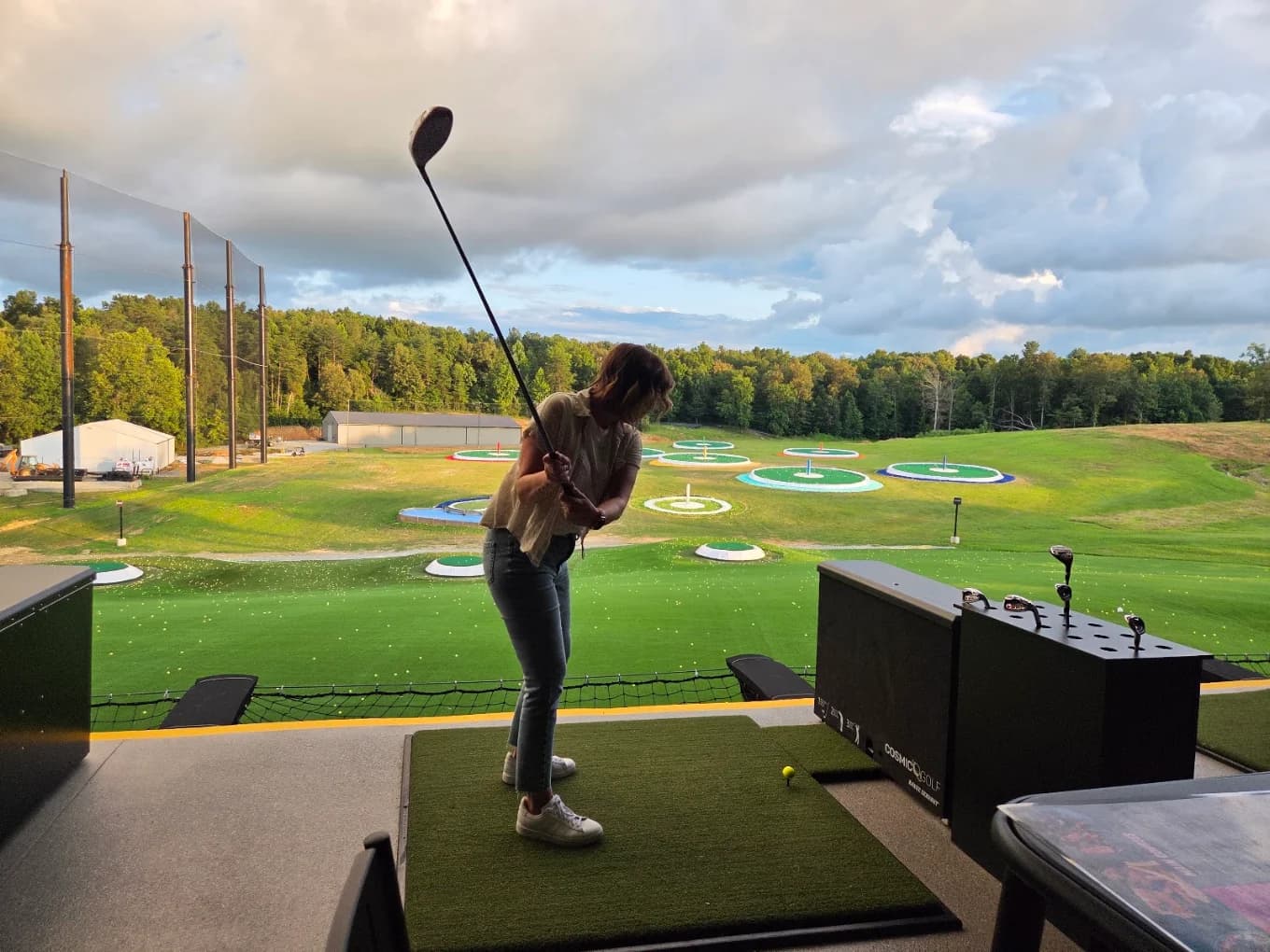 Guest taking a swing at Cosmic Golf in Elizabethtown, Kentucky