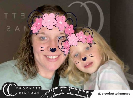 Crockett Cinemas guests posing with a flower and whiskers photo filter