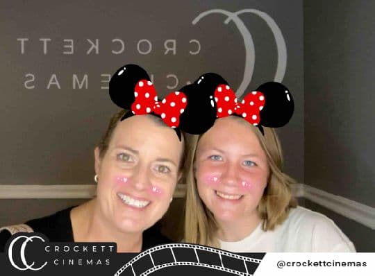Crockett Cinemas guests posing with a mouse-ear photo filter