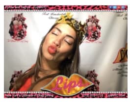 A guest posing for a Lips branded photo