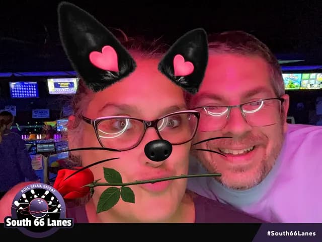 Two South 66 Lanes guests posing with a cat filter