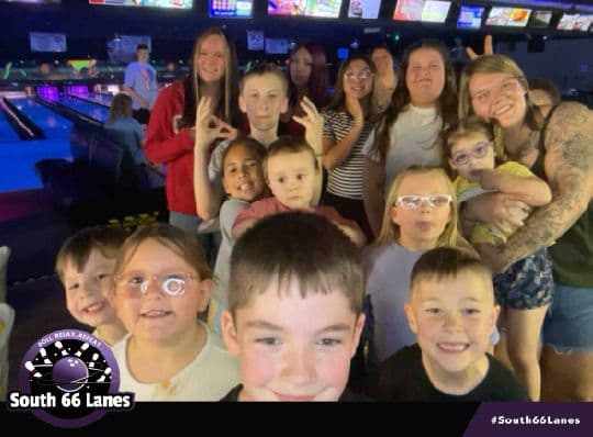 Group of South 66 Lanes guests posing for a bowling photo