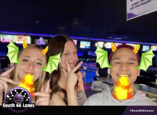 South 66 Lanes guests using a colorful fantasy photo filter