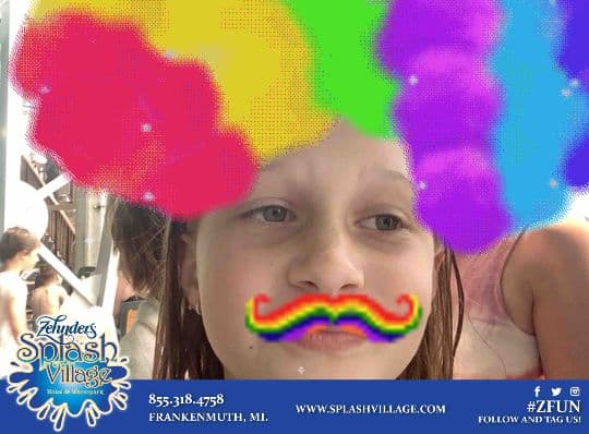 Splash Village guest with a rainbow photo filter