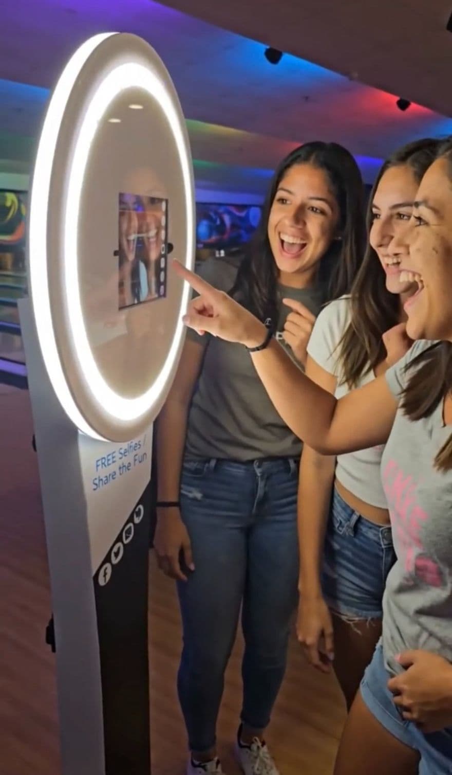 Guests taking a branded photo at BuzzyBooth
